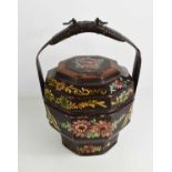 A Chinese early 20th century painted lacquered rice box, with handle.