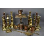 A selection of antique brass and copper, to include kettle stand, candlesticks, skillet, ladle,