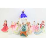 A group of Royal Doulton figurines to include Mary HN3375, Elaine HN3307, Wintertime HN3622,