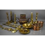 A group of antique brass and copperware, to include candlesticks, chambersticks, wine coasters,