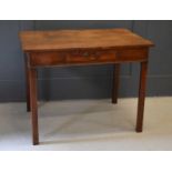 A 19th century oak side table with single drawer, chamfered legs, and single plank top. 72cm by 95cm