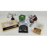 A group of collectable items to include a boxed Royal Selangor pewter letter opener, light meter,