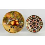 A Royal Worcester plate painted with apples and grapes by H Price, 22cm diameter A/F, together