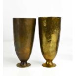 A pair of 19th century Chinese brass goblets engraved with writhen dragon decoration, and a small