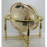 A large semi-precious gemstone globe on stand.