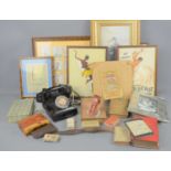 A group of books and prints and other items to include a Bakelite telephone, Josephine Baker