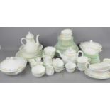 Two Royal Worcester tea / dinner services to include coffee / tea pot, tureens, soup bowl, plates,