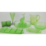 A group of Art Deco green glass ware to include a Josef Inwald flying fish bowl, a jug, frosted