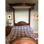 A 19th century Victorian mahogany four poster half tester 3/4 bed, the head and foot board of arched
