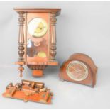 A mahogany Vienna style wall clock together with an oak cased mantle clock.