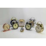 A group of vintage alarm clocks to include a Warner Brothers 1999 "Tasmania" example and a