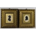 A pair of hand painted silhouette portrait miniatures of Admiral Horace Finch, and Mrs Rosemary