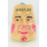A Mitchell Bros Ltd of Glasgow "Heather Dew" Old Scotch Whiskey advertising character jug.