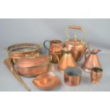 A group of antique copper ware to include kettle, jug, copper and brass lidded dish and other
