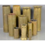 A group of WW1 and WWII brass trench art shells.