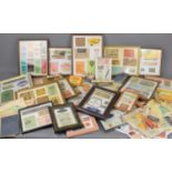 A group of framed vintage shop labels and various food and cigarette packets.