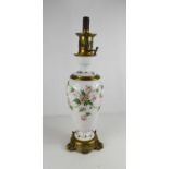 A Miller & Sons porcelain and brass Victorian paraffin lamp, stamped Miller & Sons, 179