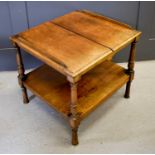 A 19th century mahogany book rest / table, the folding top having two removable book rest slides,