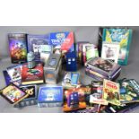 A large group of Doctor Who memorabilia to include various books, limited edition Cybermen tin box