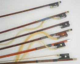 A group of 19th century and later violin bows to include examples by Vuillaume and P&H, a/f.