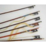 A group of 19th century and later violin bows to include examples by Vuillaume and P&H, a/f.