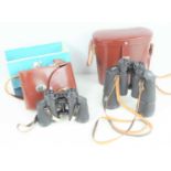 Two pairs of Carl Zeiss binoculars comprising of Jenoptem 10 x 50 and 8 x 30.
