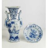 A 19th century Delft twin handled blue and white vase, together with a blue and white Chinese dish