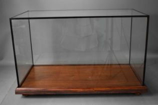 A glass and wooden model display case, 39cm by 60cm by 30cm