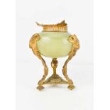 A 19th century French ormolu and onyx urn (lacking cover), the ovoid onyx body applied with gilt
