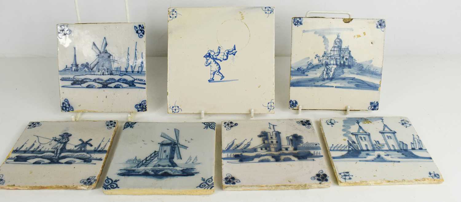 A group of 18th century and later Delft times, each depicting Dutch landscapes, windmills and a