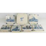 A group of 18th century and later Delft times, each depicting Dutch landscapes, windmills and a