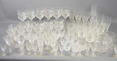A large group of mainly Stuart crystal drinking glasses of various sizes and styles.