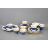 A Copeland Spode "Regent" pattern tea service, hand decorated on a blue ground and gilt border, with