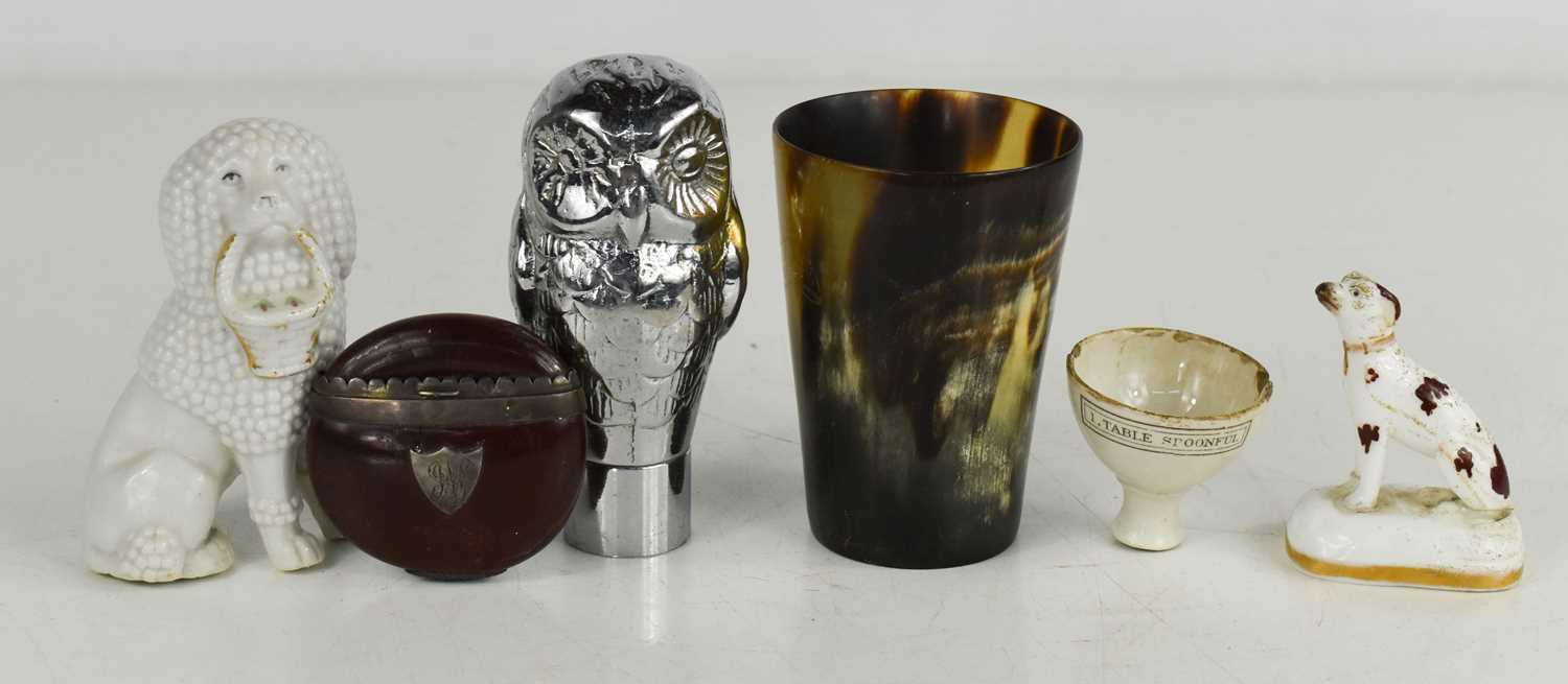 A Victorian horn beaker, Staffordshire dog, snuff box, medical cup, and owl.