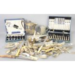 A group of silver plated items to include a boxed set of Mappin and Webb cake knives and forks,