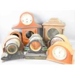 A group of oak cased mantle clocks to include Smiths examples together with various mantel and