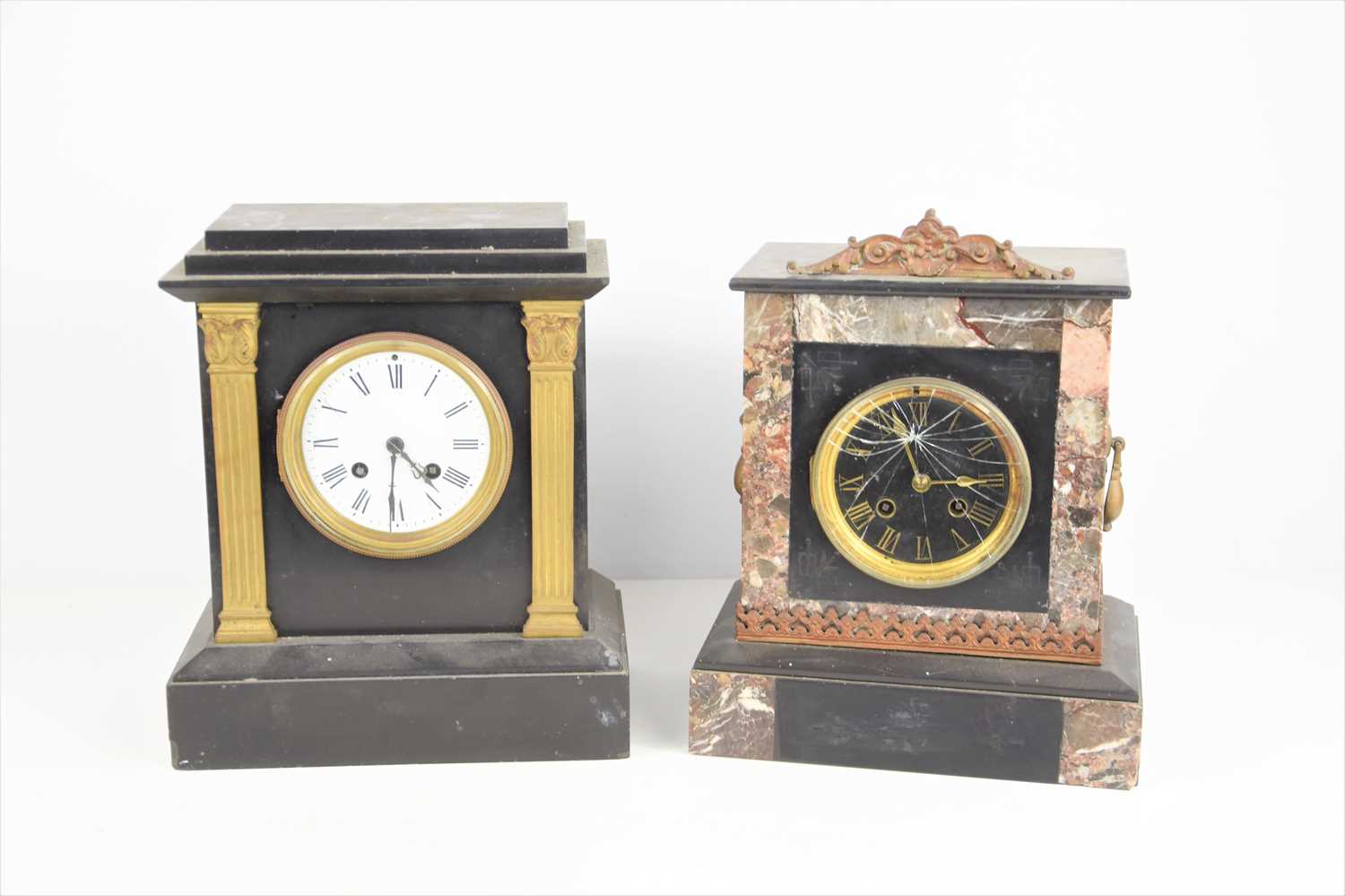 A 19th century mantle clock, twin movement, the white dial unsigned with Roman Numerals, and