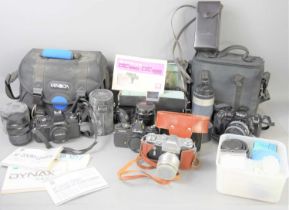 A group of vintage 35mm cameras to include Minolta XD-7, Dynax 7000i and X-370, Zenit 3M, Sankyo
