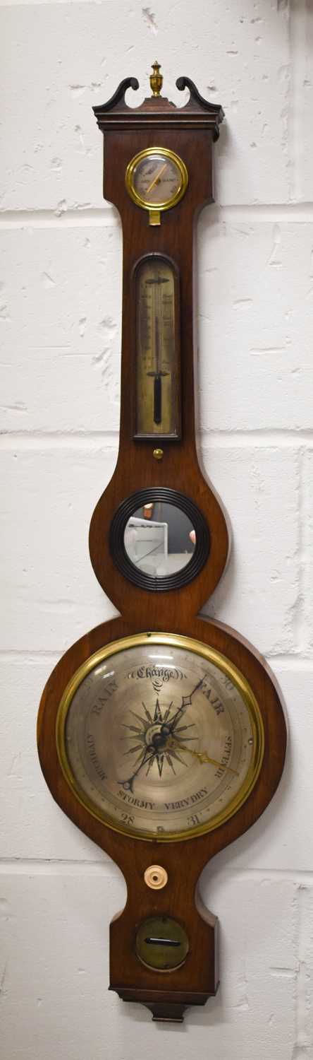 A late 19th century mahogany cased wheel barometer, 94cms tall