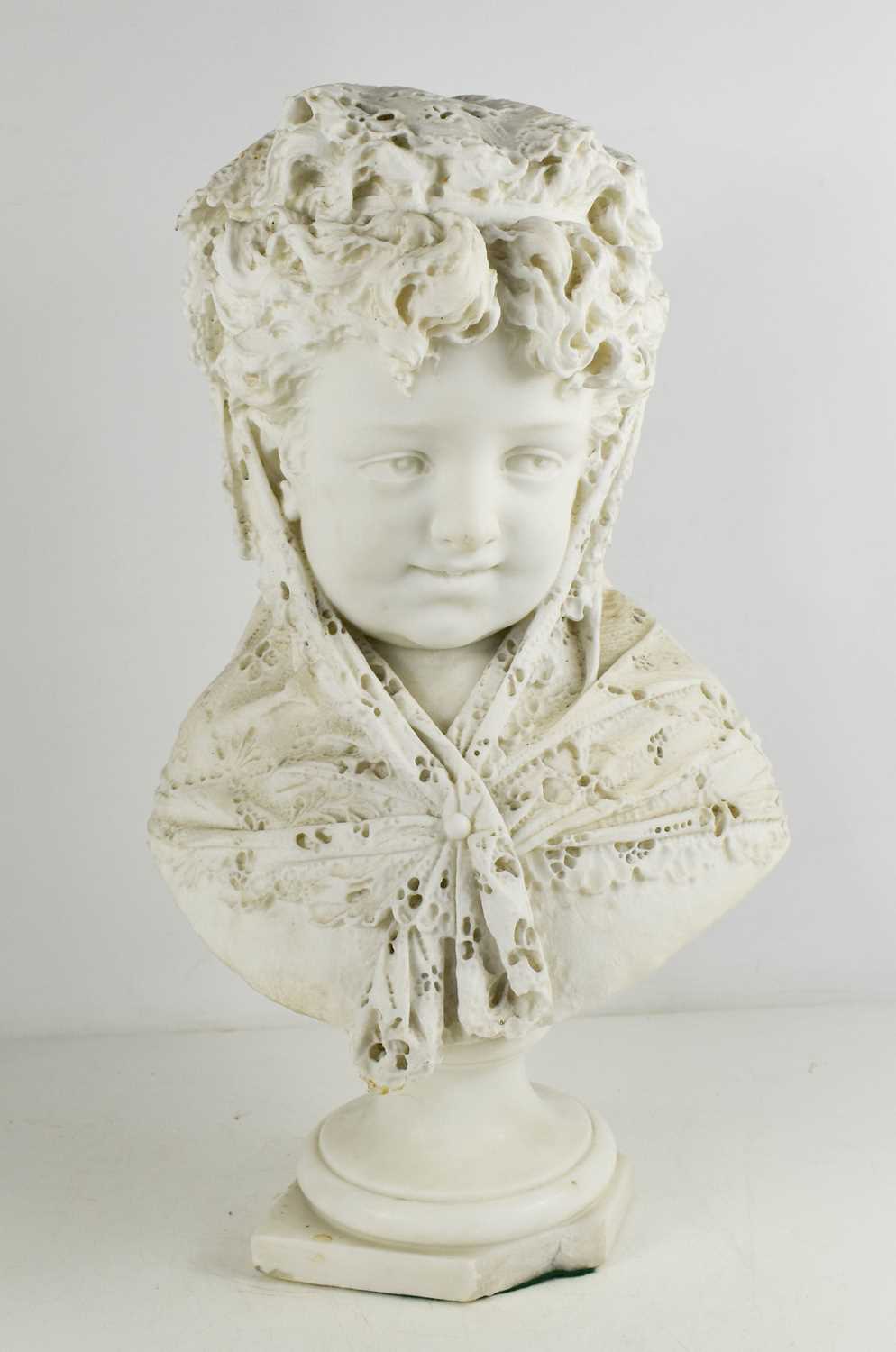 Antonio Argenti (1845-1916): a Carrera marble bust of a young lady in a mantiglia, signed verso