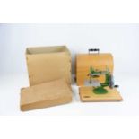 A vintage Grain toy sewing machine, boxed.