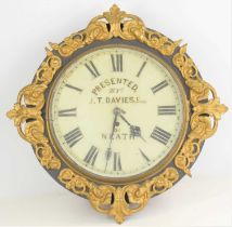 A 19th century wall clock, presented by J. T. Davies Esquire of Neath, with Roman numeral dial,