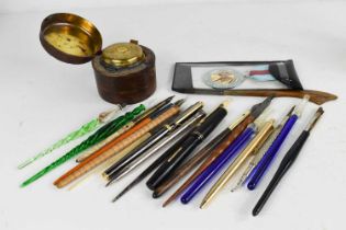 A collection of fountain pens, of various style and form, including glass examples, together with