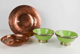 An Art Nouveau copper pierced bowl and copper charger together with two green pottery bowls with