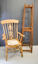 A pine kitchen armchair together with a 1960s coat stand.