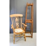 A pine kitchen armchair together with a 1960s coat stand.