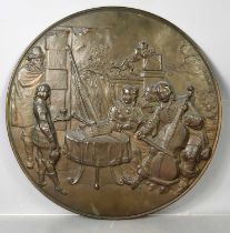 A 19th century style metal work plaque depicting musicians, 58cm.
