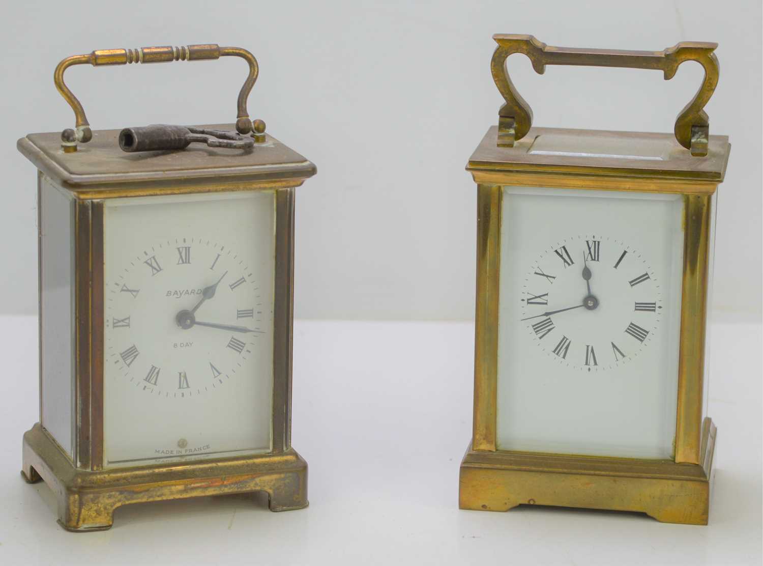 Two brass cased carriage clock to include a Bayard 8 day example.