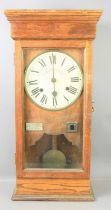A National Time Recorder Co Ltd oak cased wall-mounted industrial time recorder/clocking-in clock,