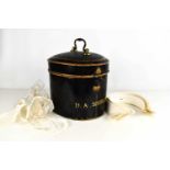 An antique barristers wig and original display tin, by Ravenscroft Law, Wig & Robe Makers,